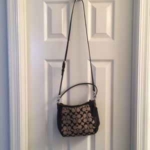 small handheld strap and long shoulder strap